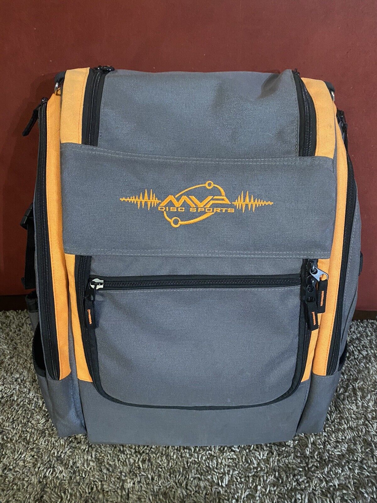 Mvp Discs Disc Golf Backpack Bag - Voyager - Holds 20+ Discs - Grey/orange